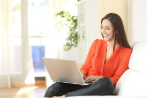 woman looking at online course